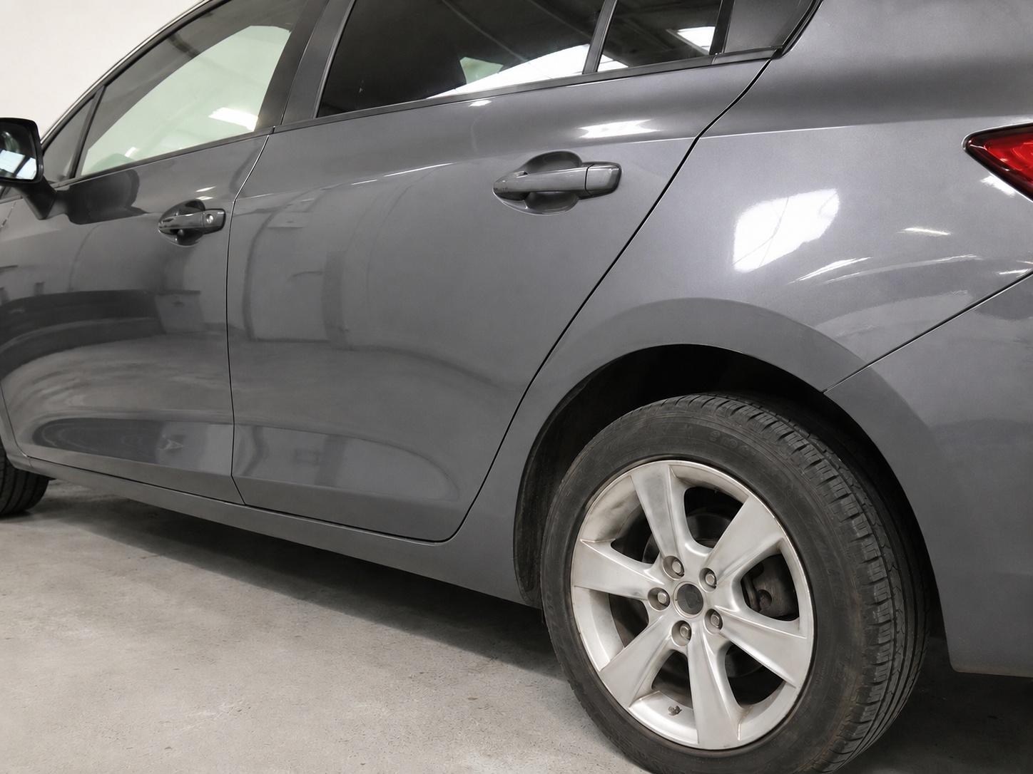 The same car panel after dent repair and refinishing at AS No1 Body Work